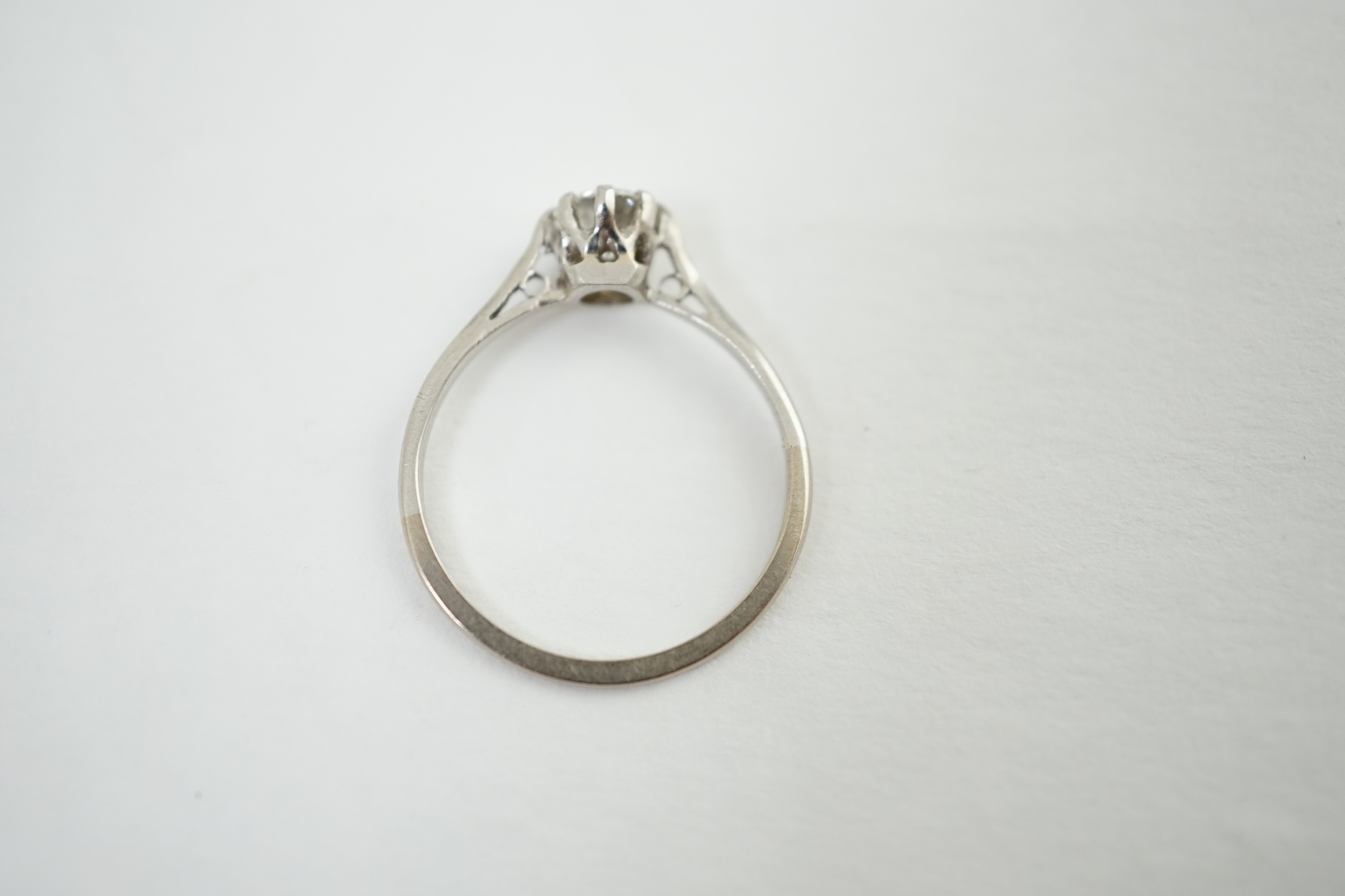 A platinum and solitaire diamond set ring